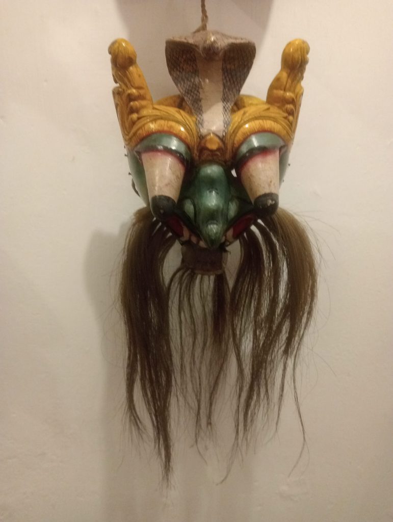 One of the scary masks in the Aiyapala Mask Museum. Each mask and its expression represents an 'ill' that it is protecting you agaianst
