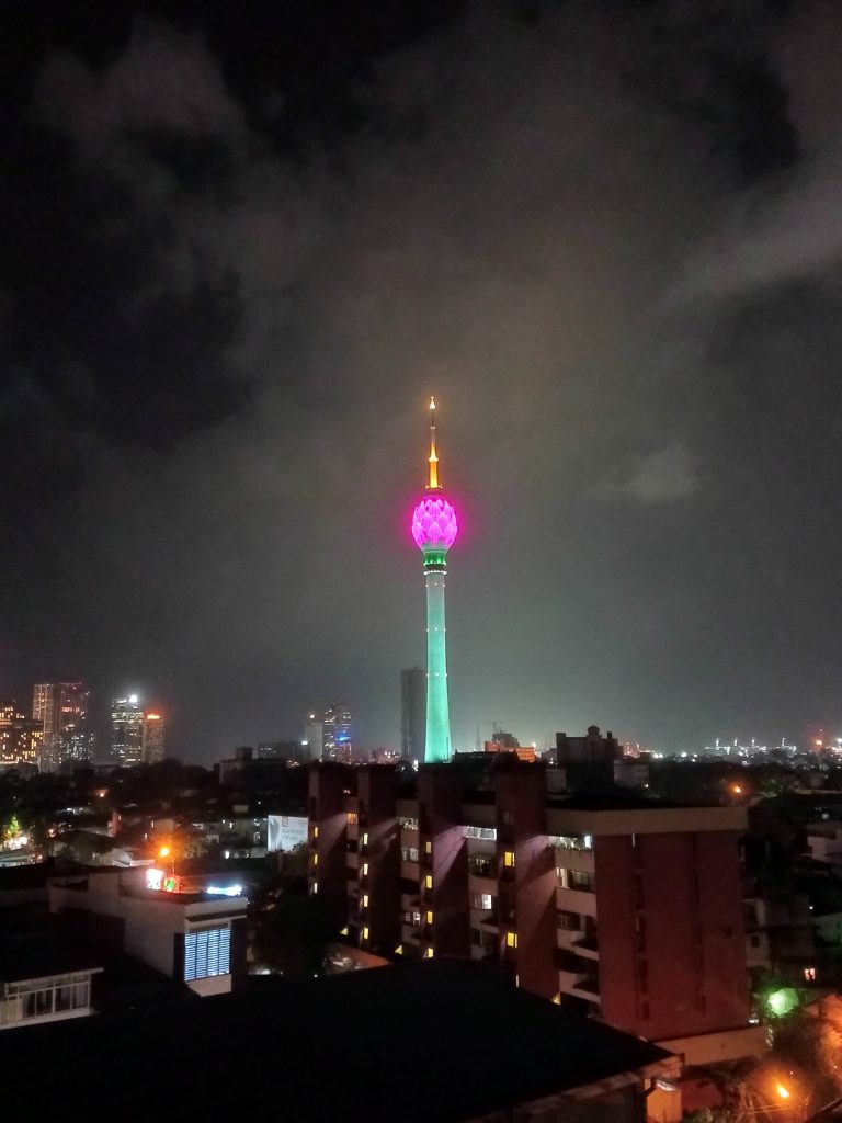 The changing lights of Colombo's Lotus tower, red, purple, blue, green and pink