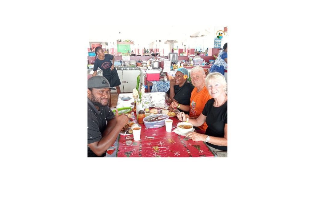 At the fruit and veg market, enjoying local food and great conversation