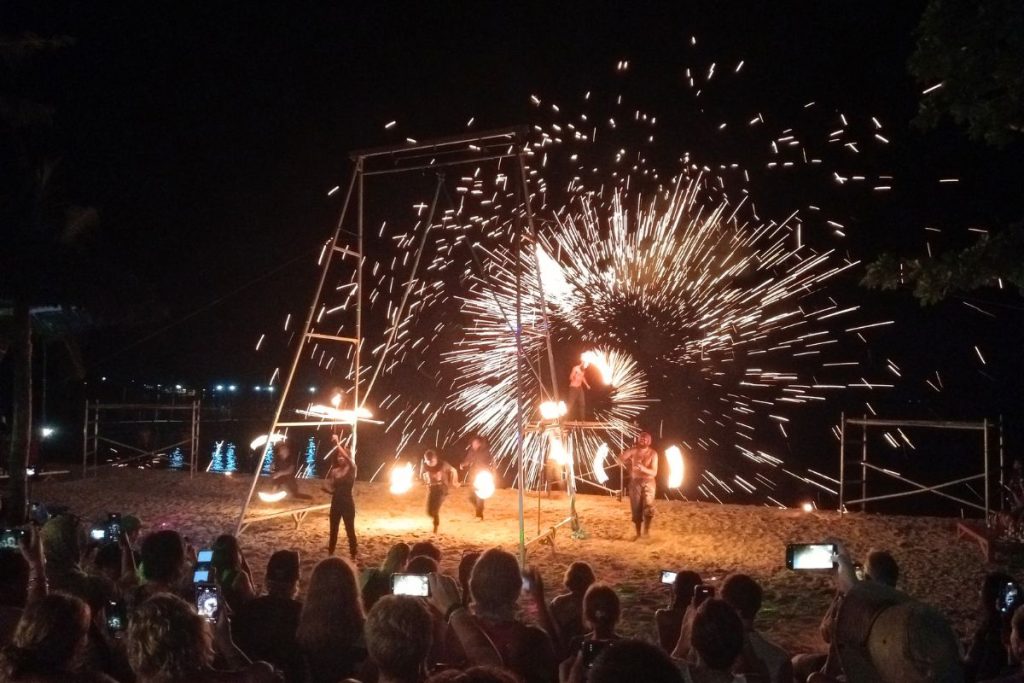 Mele Beach Bar fireshow with fire spinning round the performers 